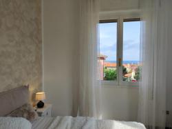 Appartamento vicino al mare con parcheggio Images