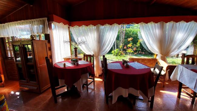 Suite com lareira na Pousada Recanto da Montanha Images_3