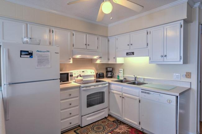 oceanfront corner unit with pools hot tubs and kiddie pool washer and dryer on second floor of building Images_4