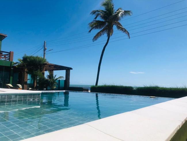 Casa praia 4/4 com ar em frente ao mar na Baleia Images_1