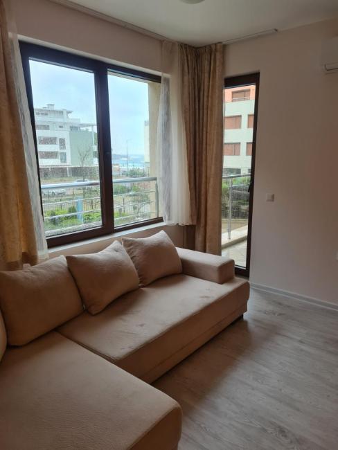 Modern 1BR Apartment with Sea View & Pool Included with Parking Space Images_2