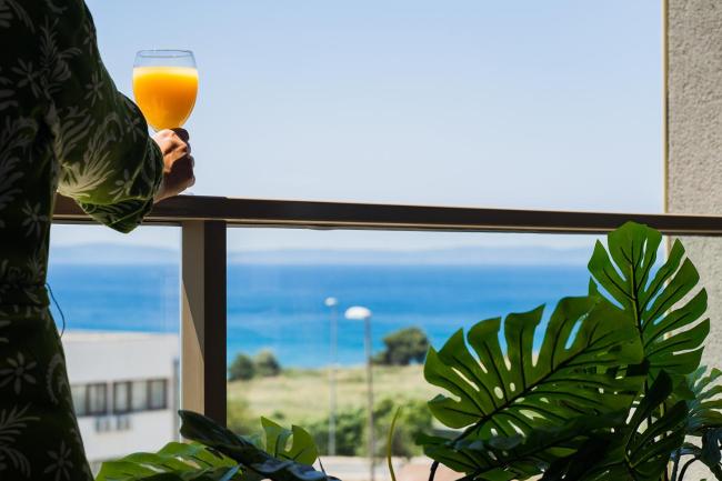Sunny Seaside Apartment Split Images_1
