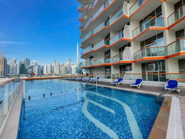 Lush apartment with Burj Khalifa and Canal view Images_1