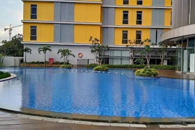 Apt Pejaten Park 2 BR Rust dgn Swim Pool & Netflix Images_4