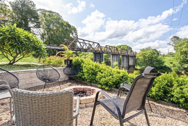 2BR Riverfront Serenity Shack with Nature Views Images_1