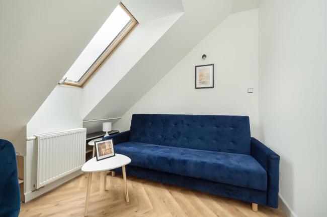 Spacious Apartment for 11 with 5 Bedrooms in Wrocław by Noclegi Renters Images